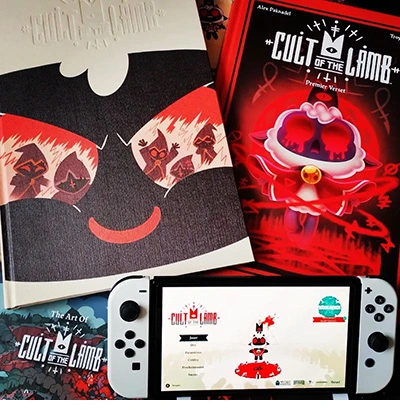 les deux versions collector de la bd Cult of the lamb et le jeu vidéo sur la Switch Oled